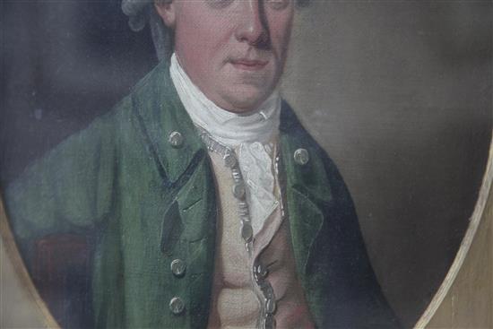English School c.1780 Portrait of a gentleman wearing a green coat, oval, 12.5 x 9.5in.